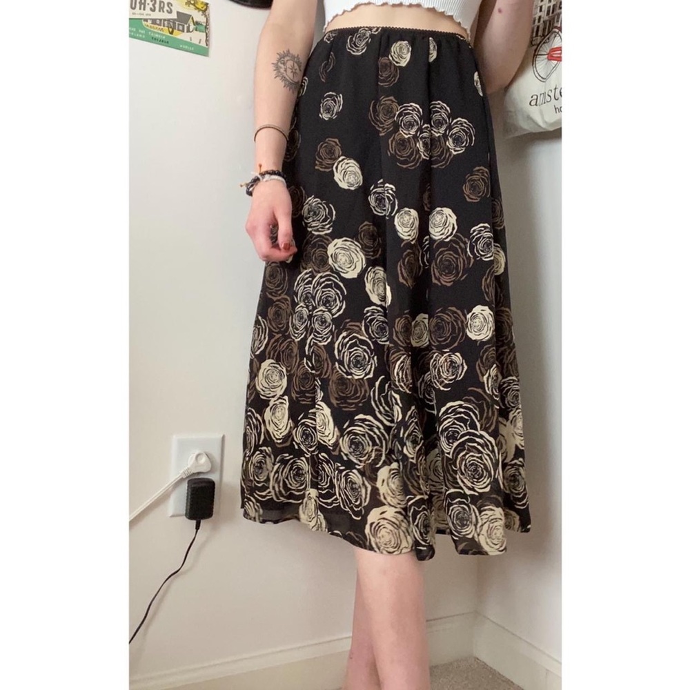 black mid length skirt w/ roses